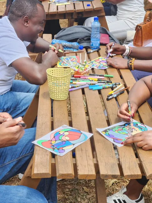 Participants adding colour to their individual artworks